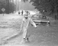Mountain Creek in Mount Holly Springs floods South Baltimore Ave in front of The Deer Lodge.