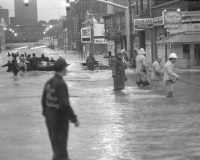 Rescue at Market and Cameron: Emergency workers form a human chain.
